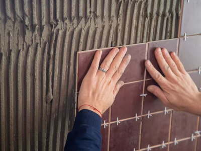 Tiling Works master puts tile wall selective focus 511072 1365.avif